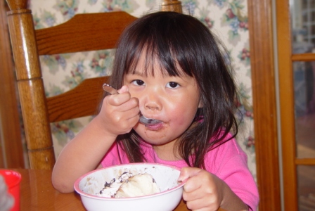 Kasen enjoying ice cream cake